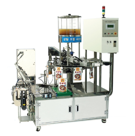 로타리식 액상 충전 포장기계